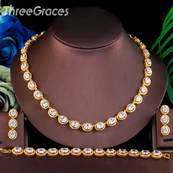 ThreeGraces Muhteşem Nijeryalı Altın Renk 3 adet Beyaz Büyük Yuvarlak CZ Kadınlar Düğün Parti Kolye Küpe Bilezik Takı Seti TZ561
